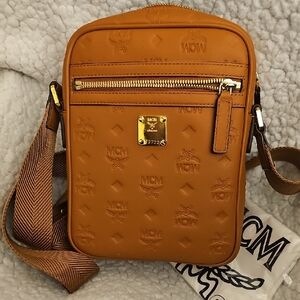 Auth MCM Tan Monogram Embossed Crossbody Bag